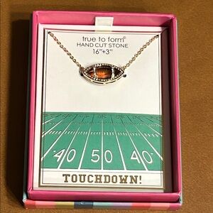 True To Form football pendant